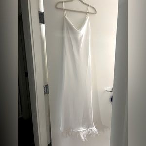 White maxi dress with feathers